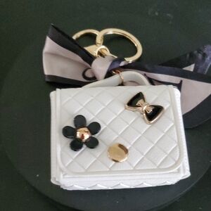 Chic White Quilted Keychain with Bow and Flower Accents